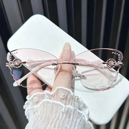 Pink butterfly rimless glasses with rhinestones