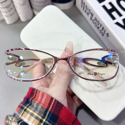 Upgrade your aesthetic with our futuristic Y2K oval glasses! Featuring a sleek plum metallic finish and unique cut-out hinge details, these glasses blend sporty techwear vibes with retro 00s style. Perfect for cyberpunk aesthetics, streetwear looks & everyday statement. Shop now!