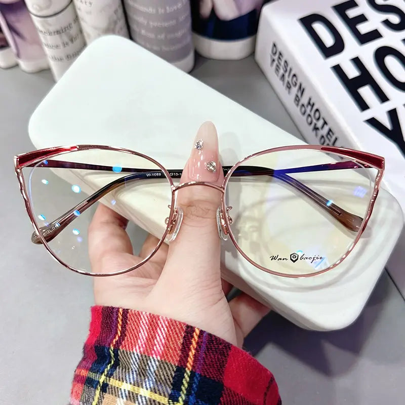 Elevate your professional style with our sophisticated two-tone metal cat-eye glasses. Featuring a refined burgundy and rose gold wing-tip design, these lightweight frames perfectly blend "office siren" aesthetics with everyday elegance. Shop the look for a polished, intellectual edge!
