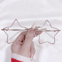 Bel Star-shaped rimless glasses