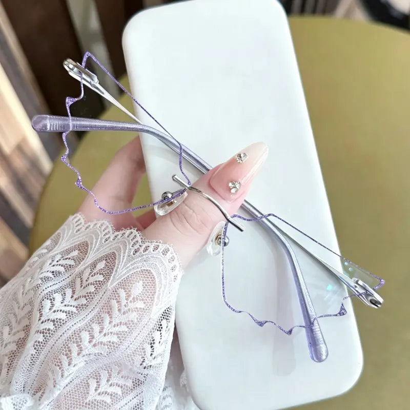Lila Rimless wing-cut glasses