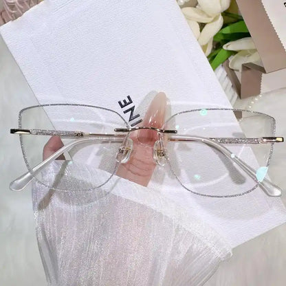 Illuminate your style with our silver glitter rimless square glasses! Featuring dreamy sparkle edge details, an oversized face-flattering shape, and lightweight metal temples. Perfect for Y2K & soft glam aesthetics. Shop now!