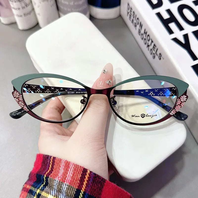 Embrace retro sophistication with our two-tone cat eye glasses! Featuring a chic olive green and wine red color-blocked silhouette accented with delicate carved floral corner details and patterned temples. Perfect for office siren vibes, dark academia aesthetics & unique everyday wear. Shop today!