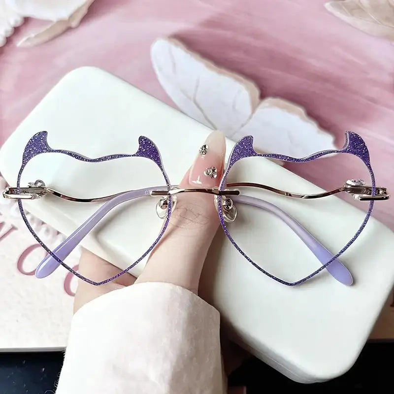 Stand out with our Y2K purple glitter cat ear glasses! Featuring a unique rimless cat-shaped design, sparkly edges, and lightweight frame. Perfect for kawaii, cosplay, and gamer girl aesthetic lovers. Shop now!