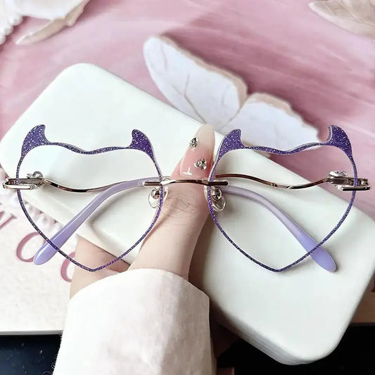 Stand out with our Y2K purple glitter cat ear glasses! Featuring a unique rimless cat-shaped design, sparkly edges, and lightweight frame. Perfect for kawaii, cosplay, and gamer girl aesthetic lovers. Shop now!