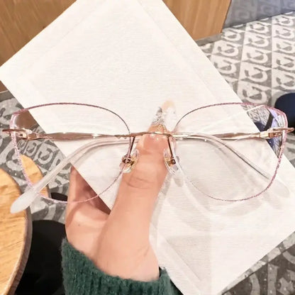Add a romantic sparkle to your look with our pink glitter edge rimless cat eye glasses! Featuring a shimmering rose pink border, sleek rose gold temples, and lightweight oversized clear lenses. Perfect for coquette, soft girl & fairycore aesthetics. Shop now!