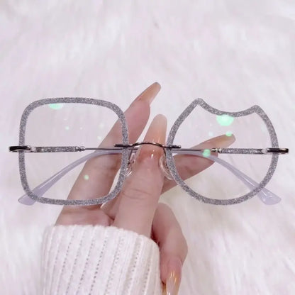 Stand out from the crowd with our quirky asymmetric silver glitter rimless glasses! Featuring a show-stopping mismatched design—one soft square lens and one adorable cat head lens—wrapped in chunky sparkling silver glitter. Perfect for Y2K, festival outfits & unique aesthetic looks. Shop now!

