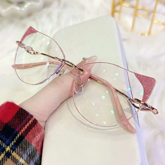 Elevate your style with our stunning glitter cat-eye glasses! Featuring a sharp, feminine silhouette with sparkling pink accents and a sleek rimless design, these statement frames are perfect for coquette aesthetics, party looks, or creative photoshoots. Shop the glam trend today!